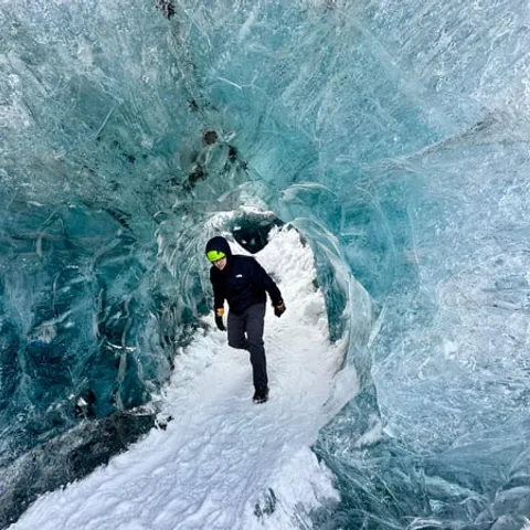 The rippled blue ceiling of a crystal ice cave